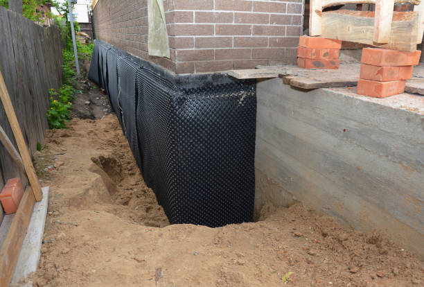Happy homeowners after waterproofing job in Oceanside